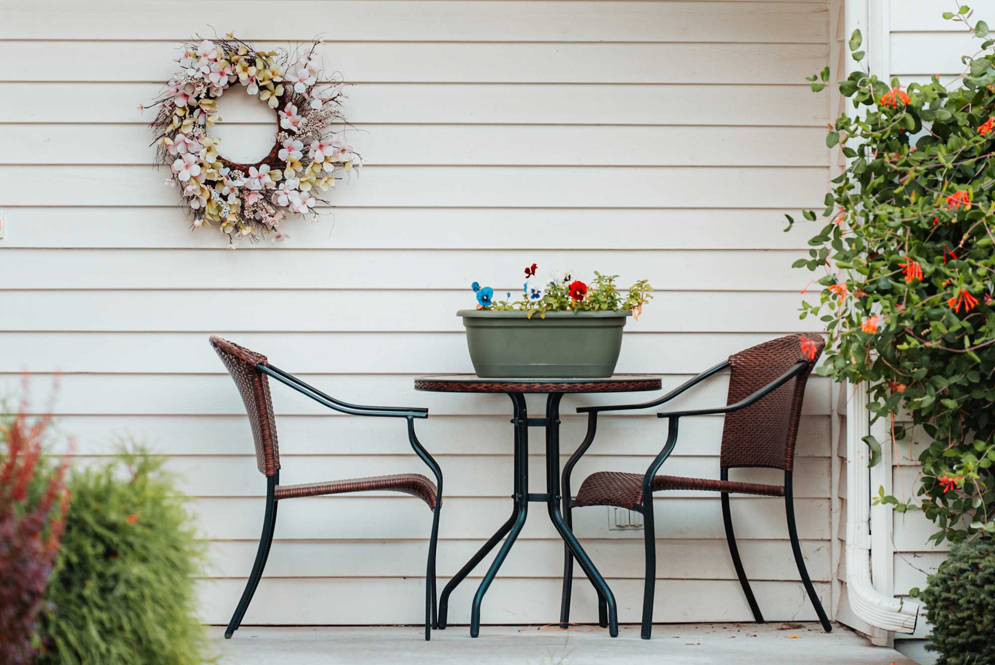 table and chairs on porch