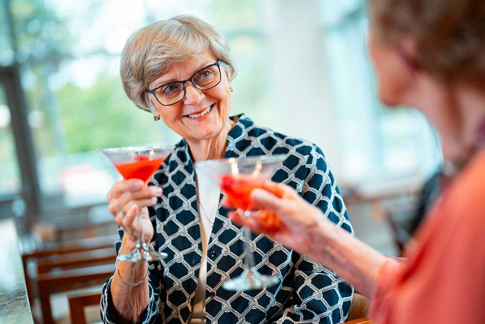 women toasting with drinks