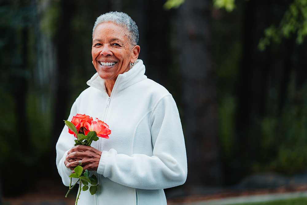 woman holding flowers