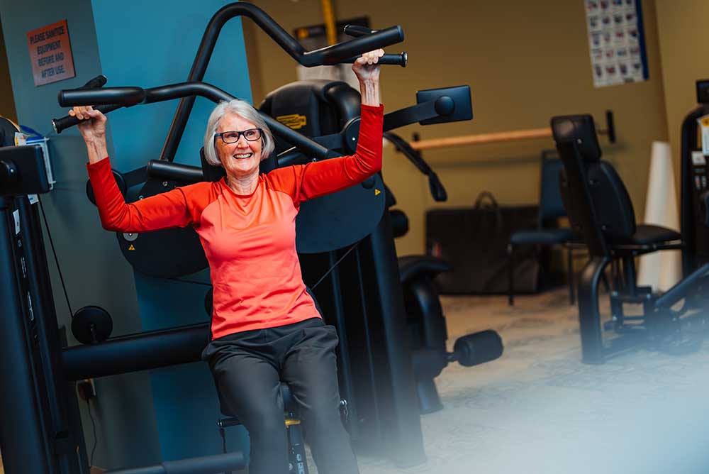 Woman on exercise machine