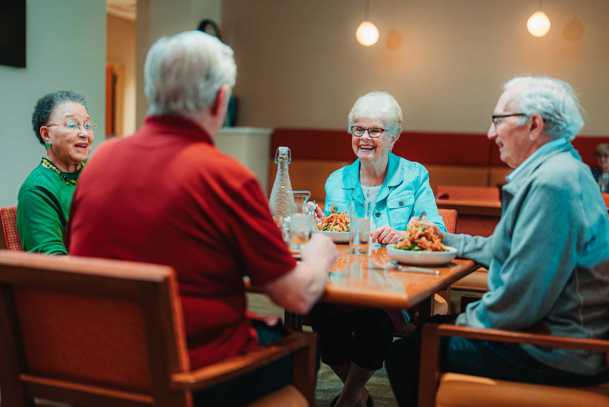 group of fiends having dinner at a restaurant